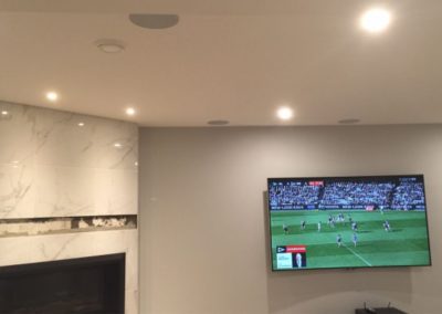 Finished residential room with recessed lighting